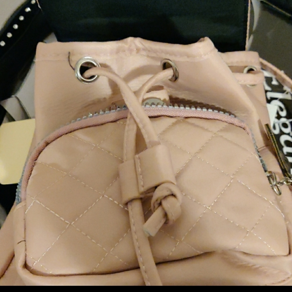 Light pink mini backpack purse